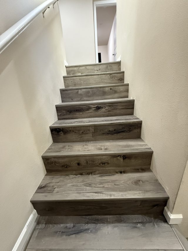 staircase with wood-look treads and risers