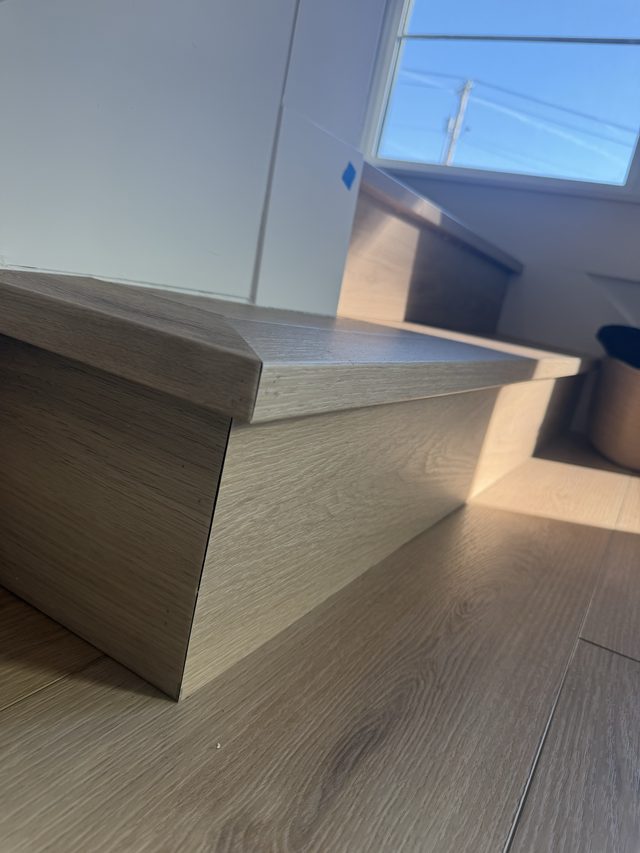 wood stair tread and stairnose with hardwood floor